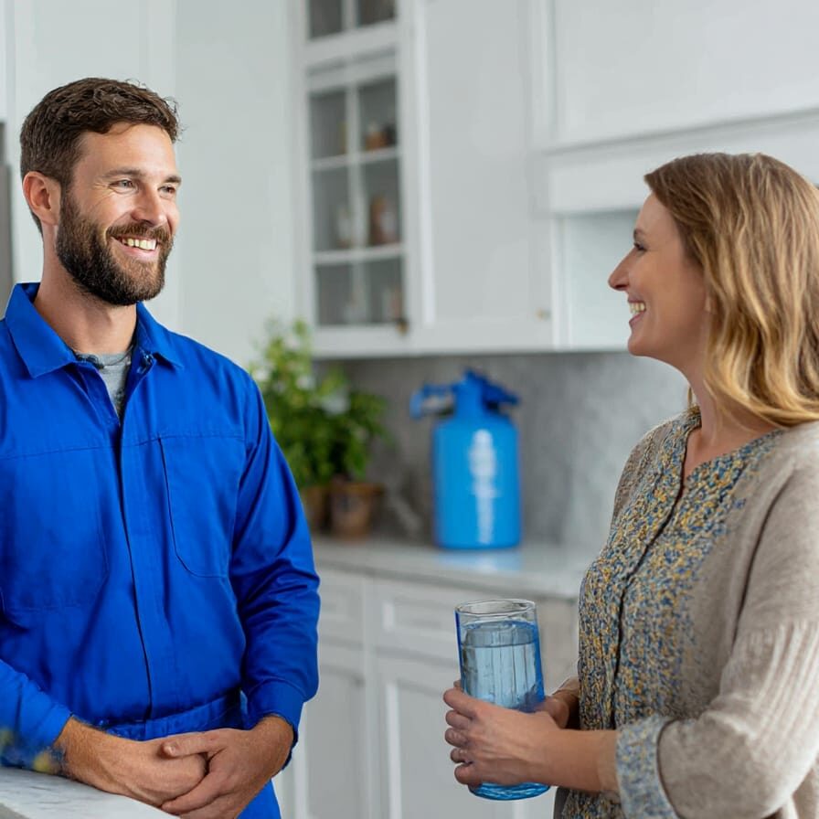 water filtration expert speaking with homeowner
